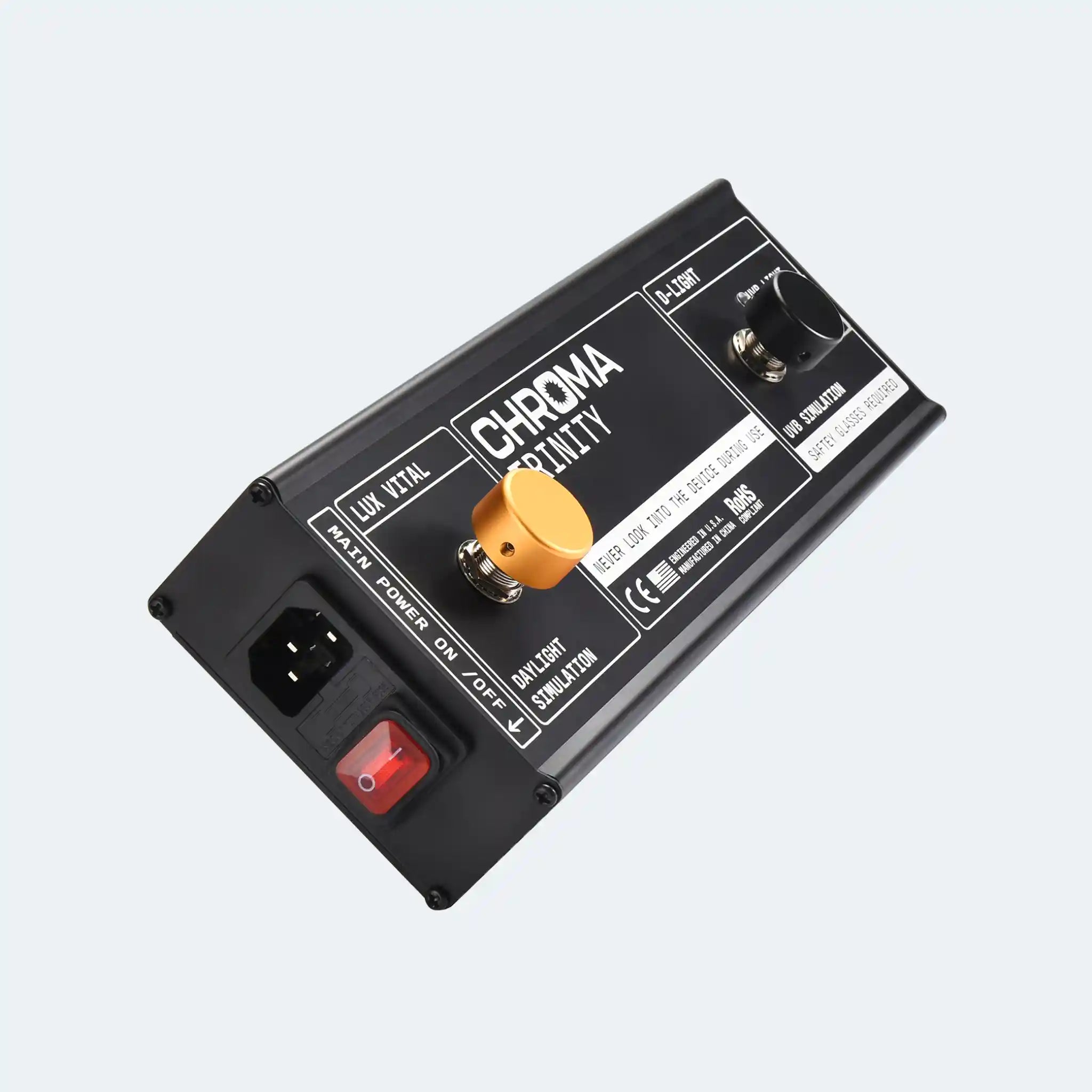 Black electronic device with 'Chroma Trinity' branding on a light gray background