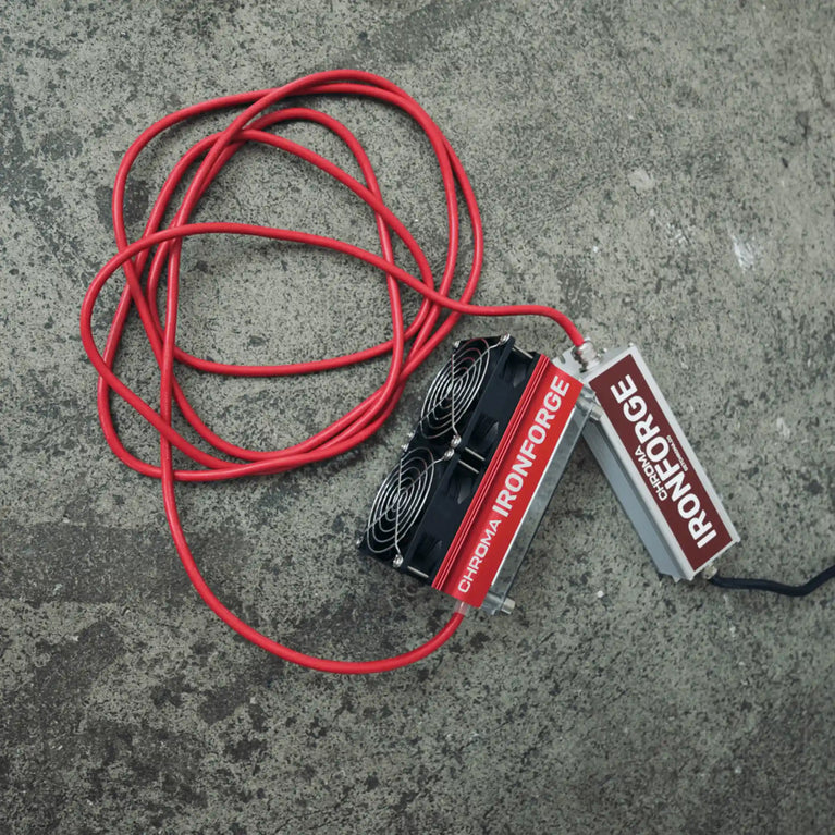 Chroma Ironforge Light Therapy Device being viewed from a topdown perspective. Device and cables are being shown.