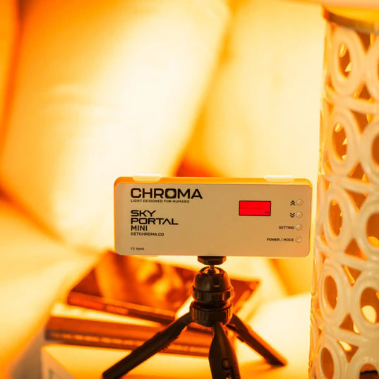 Chroma Sky Portal Mini device on a tripod with warm lighting