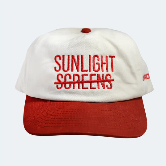 White cap with red text 'SUNLIGHT SCREENS' on a white background